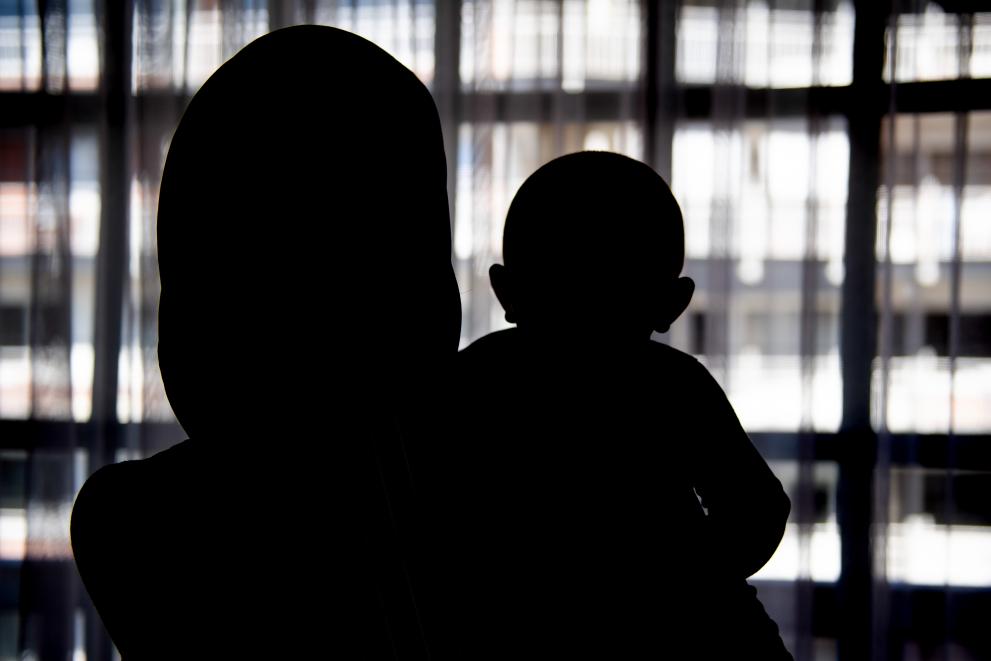 A woman and her child locked in their home