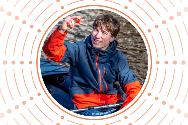 Fionn Ferreira in a kayak in the ocean testing water samples